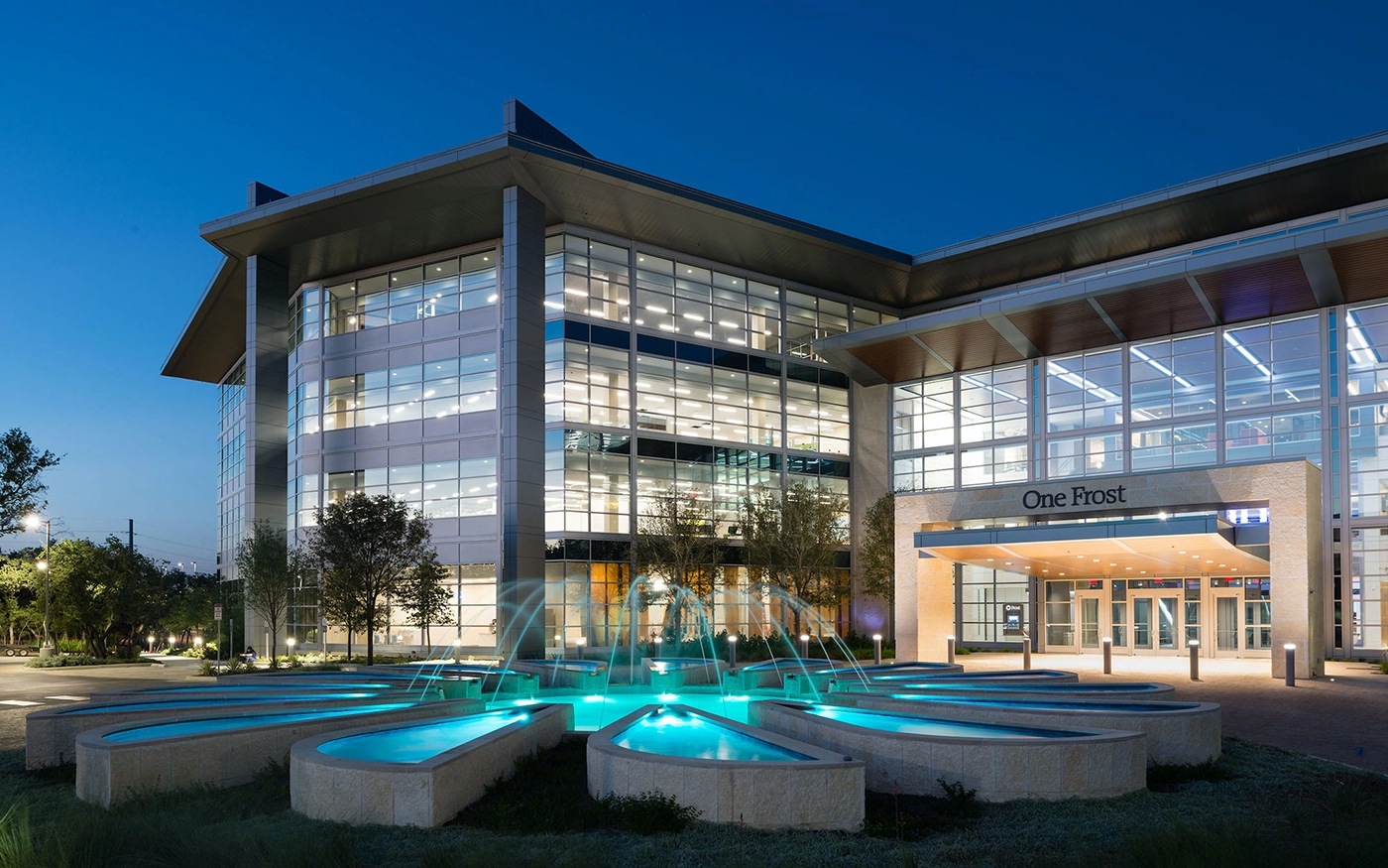 frost bank water feature at night Corporate water feature builder in texas