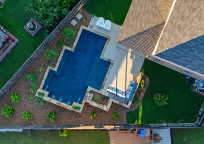 overhead view of a pool and landscaping