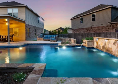 a geometric pool with water features