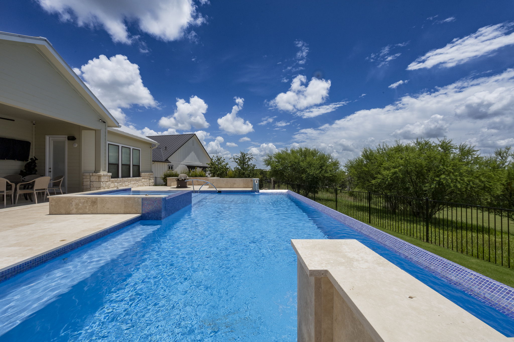 12-web-or-mls-IMG_0977-HDR daytime pool with custom spa